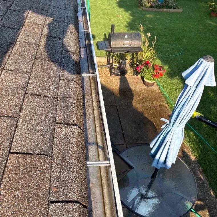 Gutter run cleared and flushed through, O'Fallon